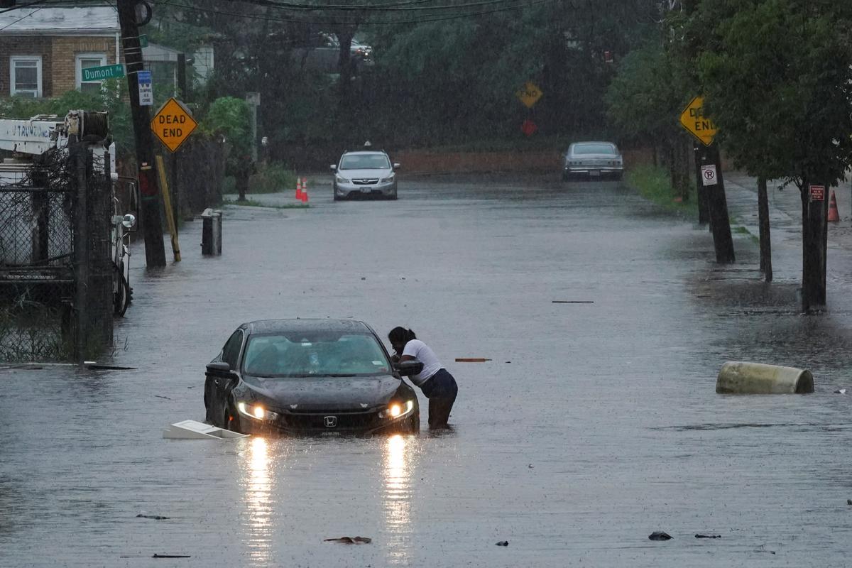 Car submerged in heavy rain in NYC