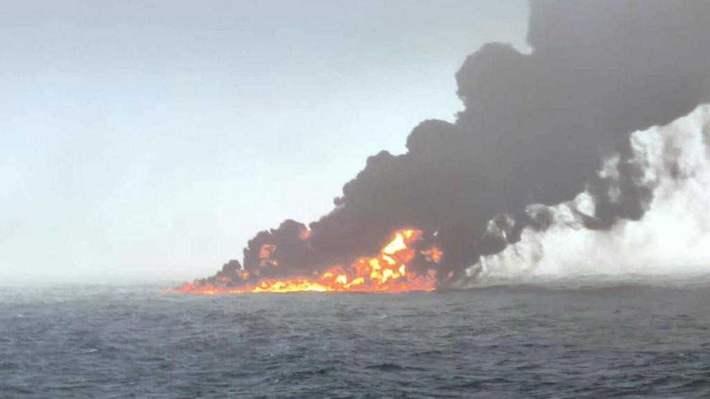 US Military Oil Tanker collides with cargo ship.