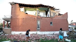 At least 21 dead after tornadoes sweep through US Midwest.
