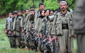 Kurdish group PKK says it is laying down arms and disbanding.