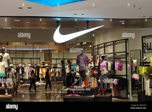 Nike to raise prices as firms face tariffs uncertainty.