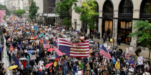 Mass protests against Trump across US as president holds military parade.