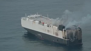 Cargo ship carrying new vehicles to Mexico sinks in the North Pacific weeks after catching fire.