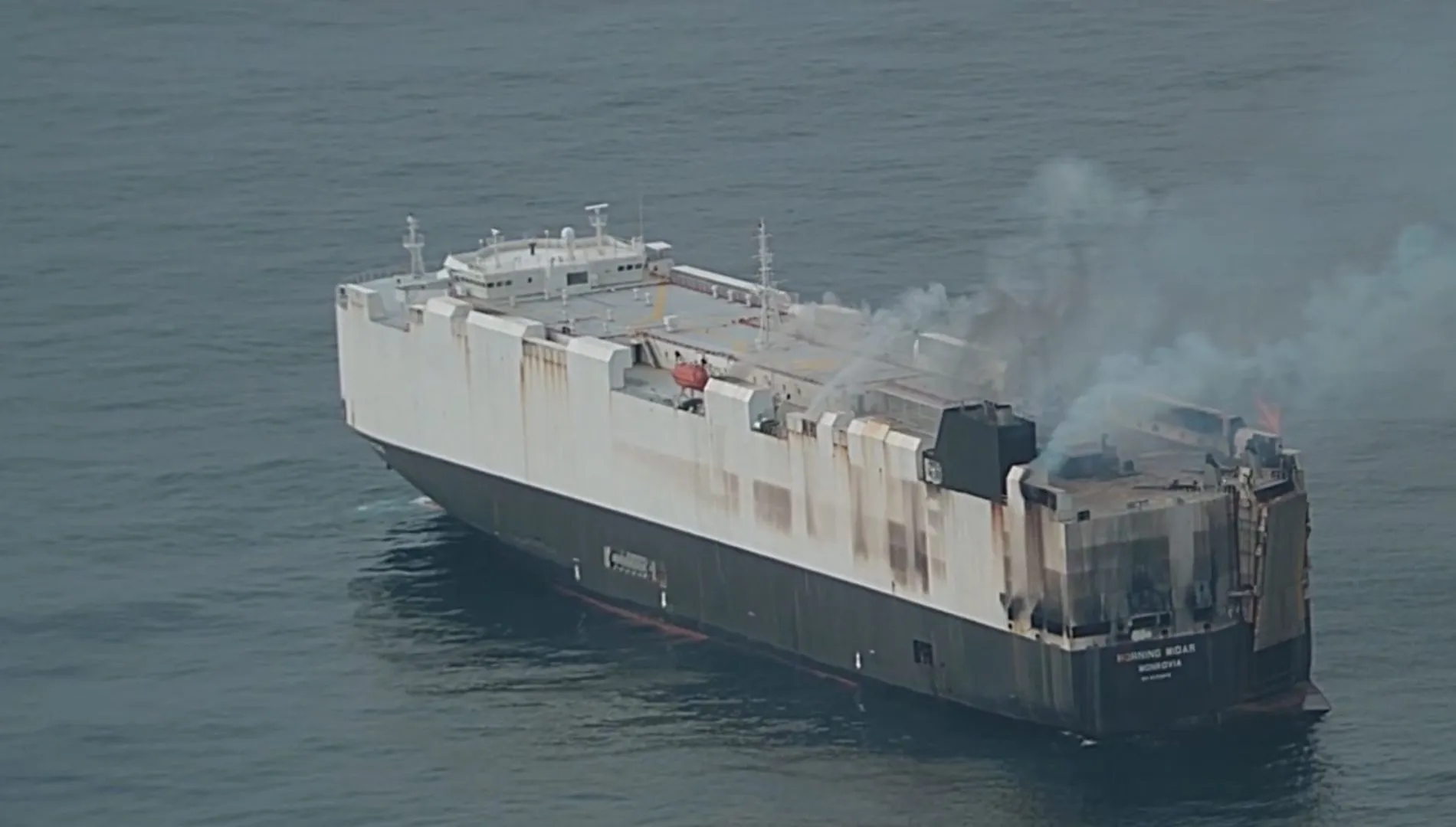 Cargo ship carrying new vehicles to Mexico sinks in the North Pacific weeks after catching fire.