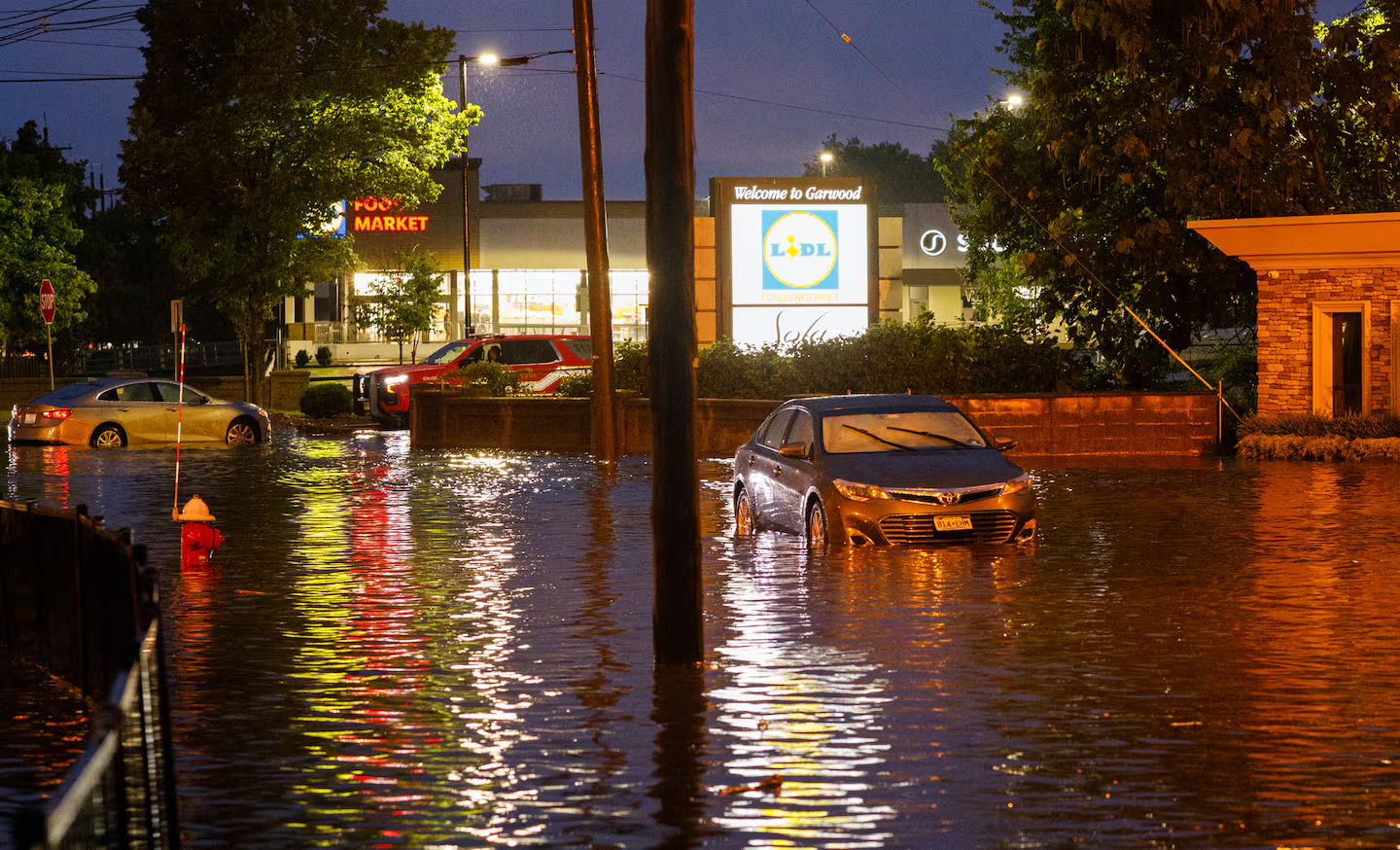 Two dead after flash flooding in New Jersey and New York City.