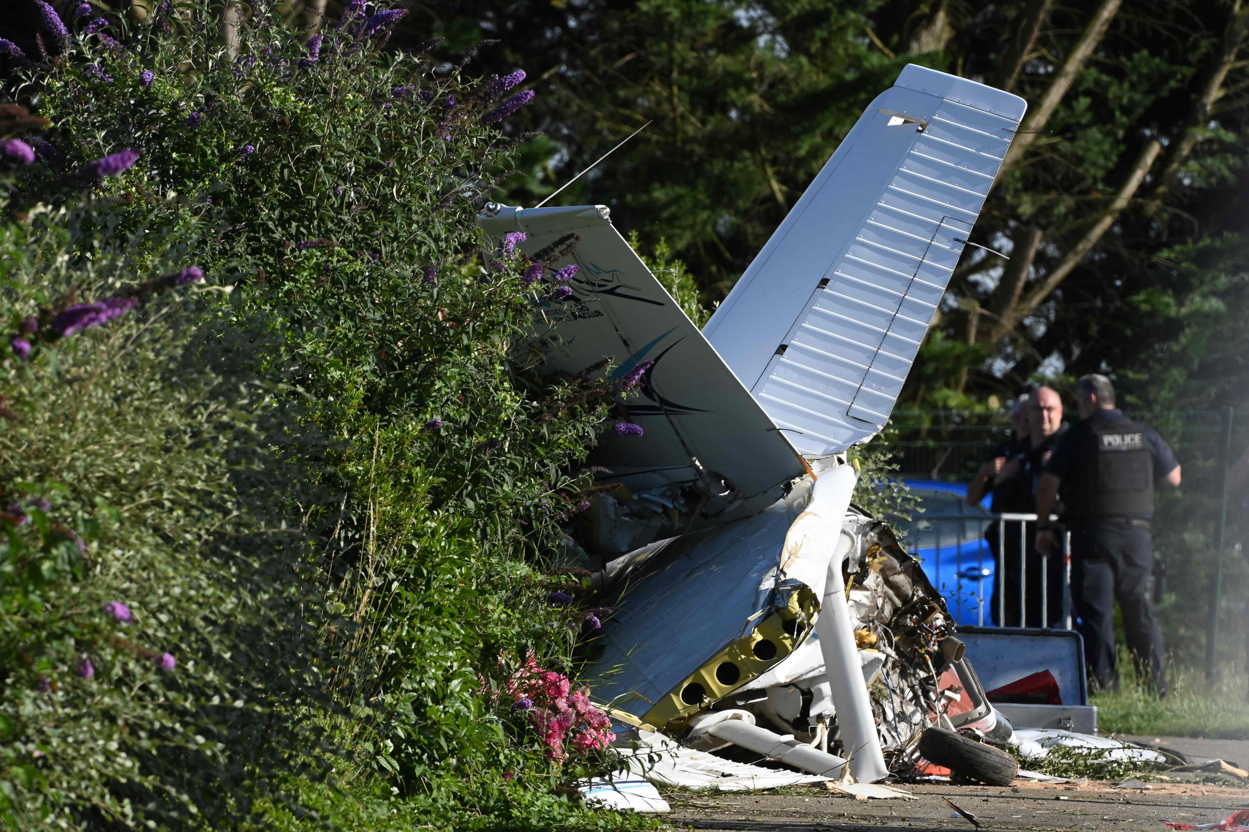 Skydiving plane with 15 people onboard goes off runway at New Jersey airport, injuring multiple people.