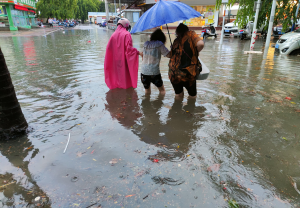 Storms unleash a year’s rain on Chinese city in one day.