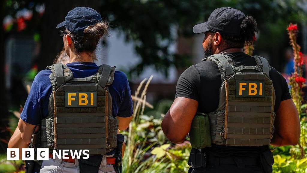 FBI fires agents pictured kneeling at George Floyd protest, US media report.