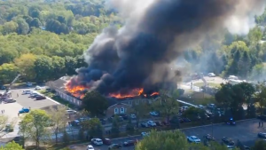 Four killed in shooting and arson attack at Mormon church in Michigan.
