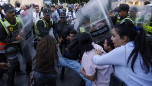Two killed as violence flares in Morocco protests.