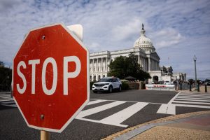 Judge orders Trump administration to pause shutdown layoffs.