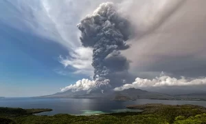 Volcano erupts near Bali, sending ash into the sky.
