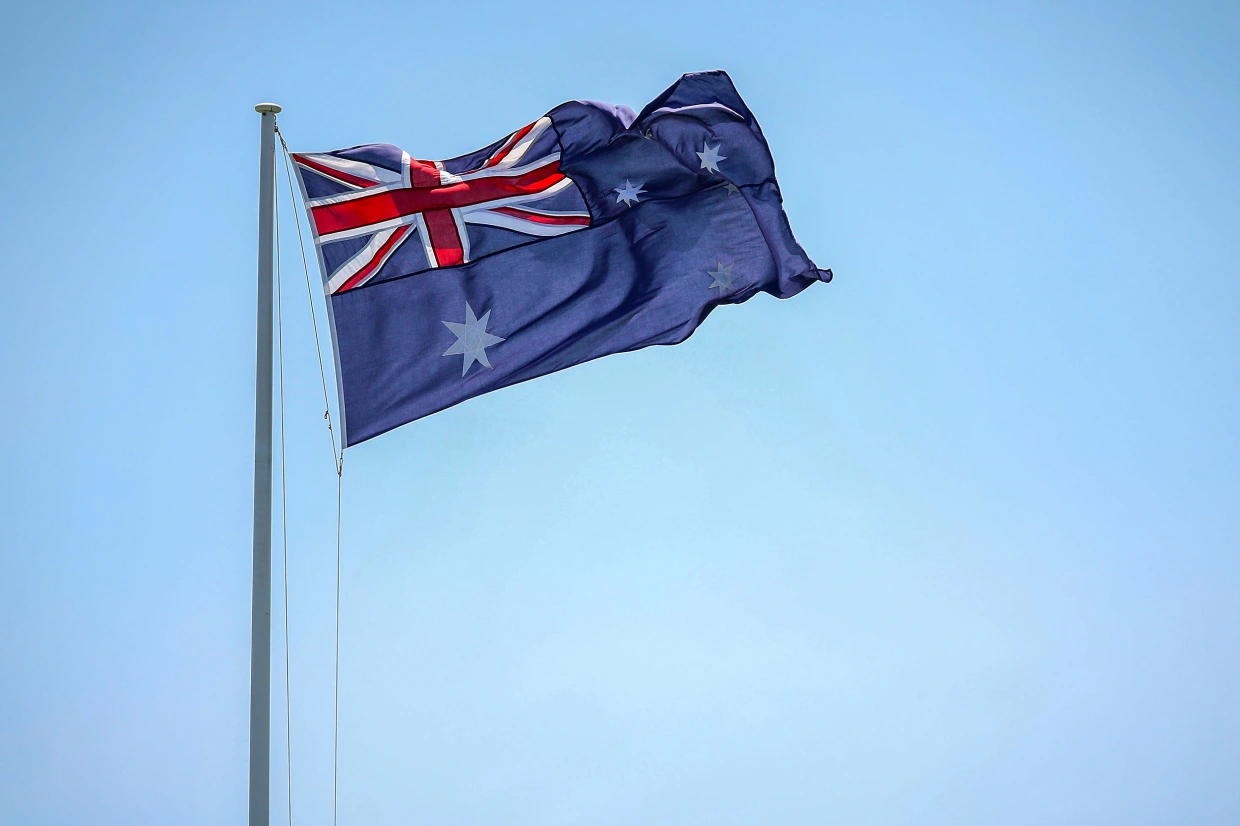 Australia to deport British man charged with displaying Nazi symbols.