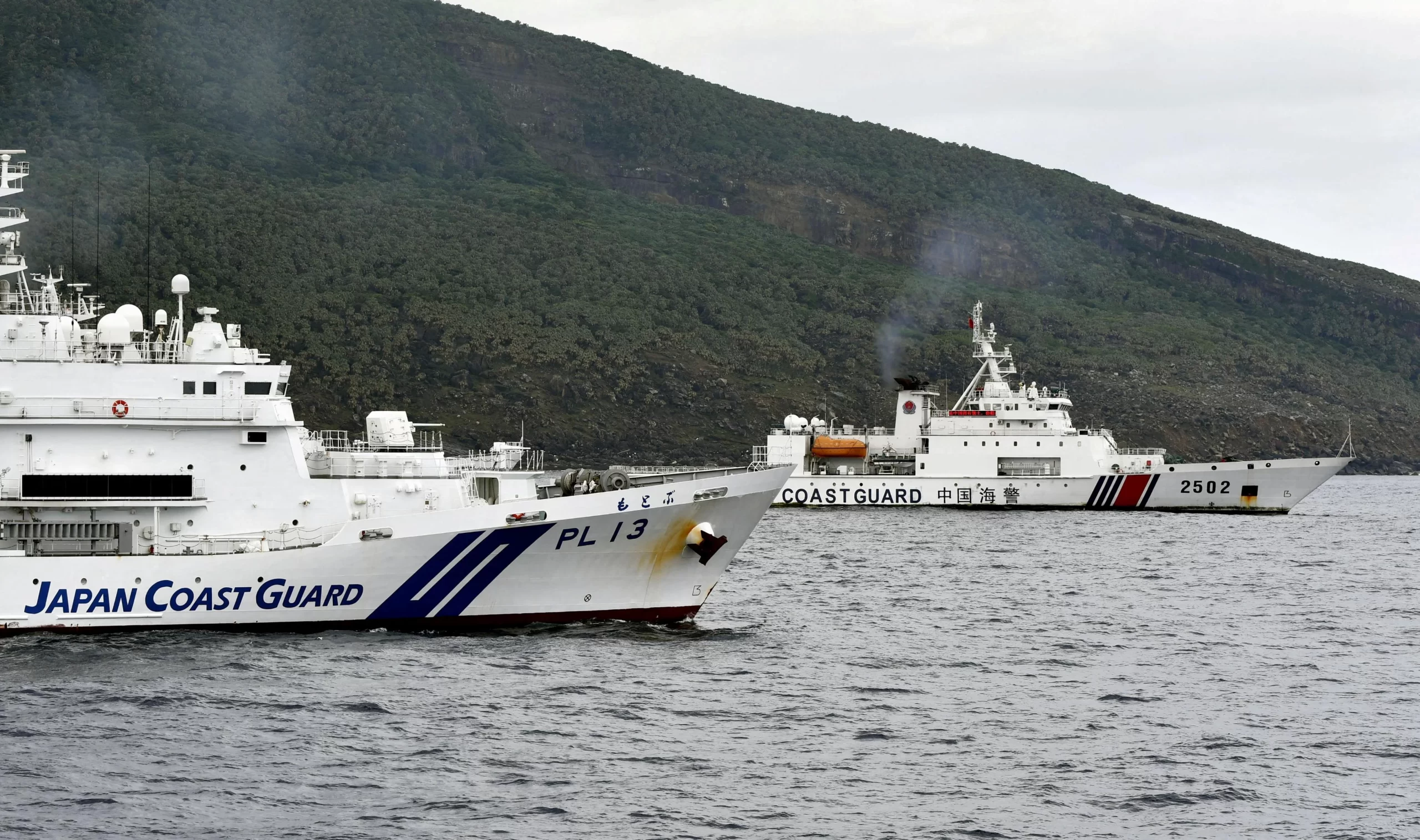 Chinese and Japanese boats face off near disputed islands as feud worsens.