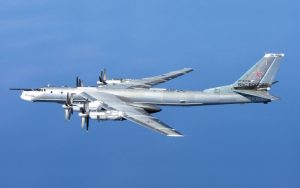 Russian bombers join Chinese air patrol near Japan as Tokyo-Beijing ties strain.