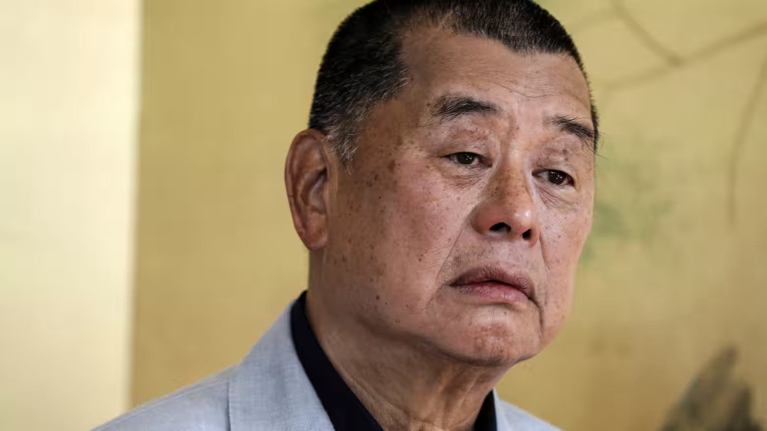 HK media mogul convicted in landmark security trial.