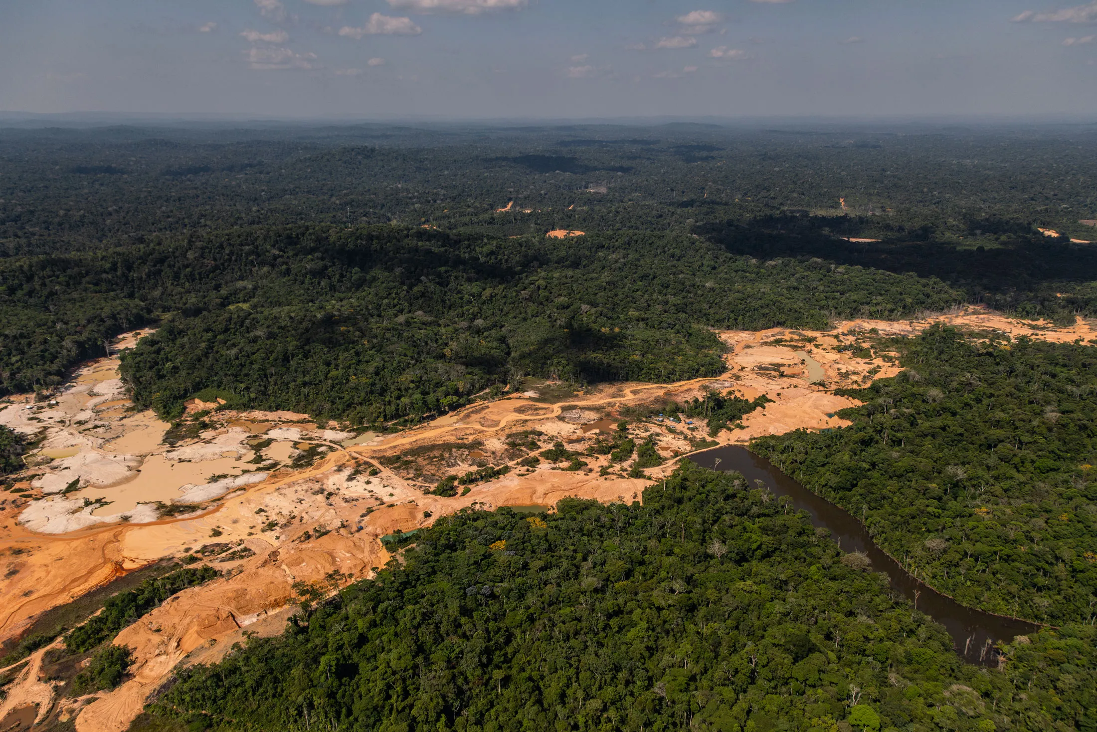 Nearly 200 arrested in cross-border crackdown on gold mining in Amazon.