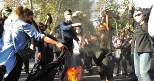 Iran security force member killed during protests, officials say.