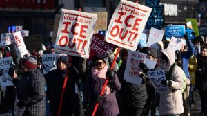 Thousands march and dozens arrested in Minneapolis protests against ICE.