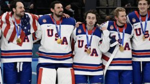 USA win men's Olympic ice hockey gold for first time in 46 years.
