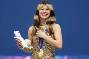USA superstar Liu wins women's skating Olympic gold.