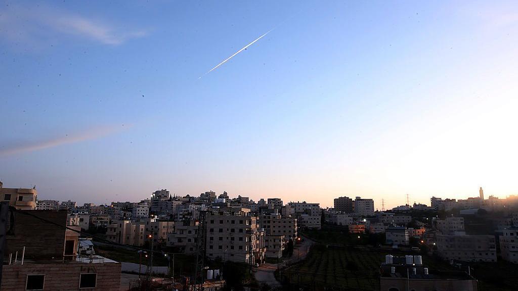 Yemen's Iran-backed Houthis launch missile at Israel for first time since war began.