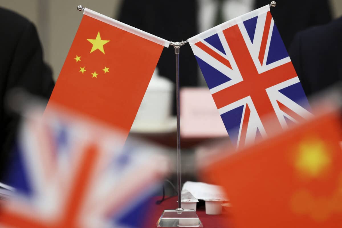 Spouses of UK MPs among three held on suspicion of spying for China.