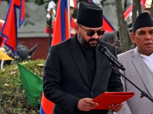 Nepal swears in ex-rapper as new prime minister.