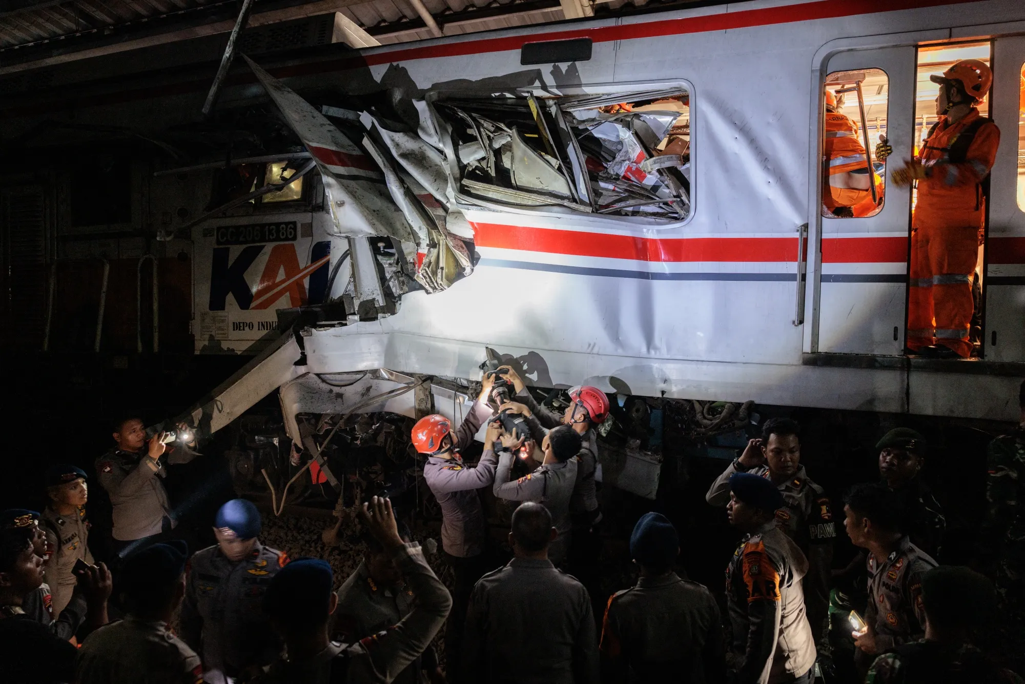 Train collision kills 14, injures dozens near Jakarta.