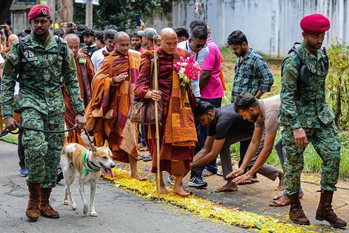 Monk ends barefoot Sri Lanka trek with plea for peace.