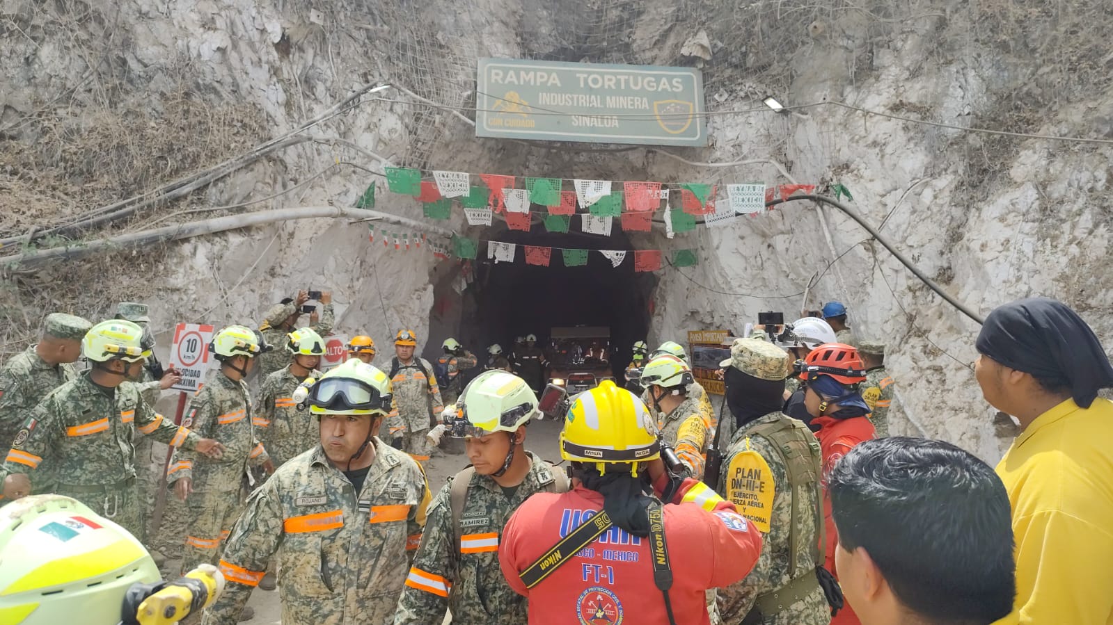 Trapped miner rescued from flooded Mexican tunnel after 14 days.