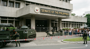 Philippine Senate in lockdown after gunshots fired.
