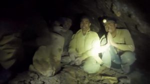 First of five men found alive in flooded Laos cave rescued.