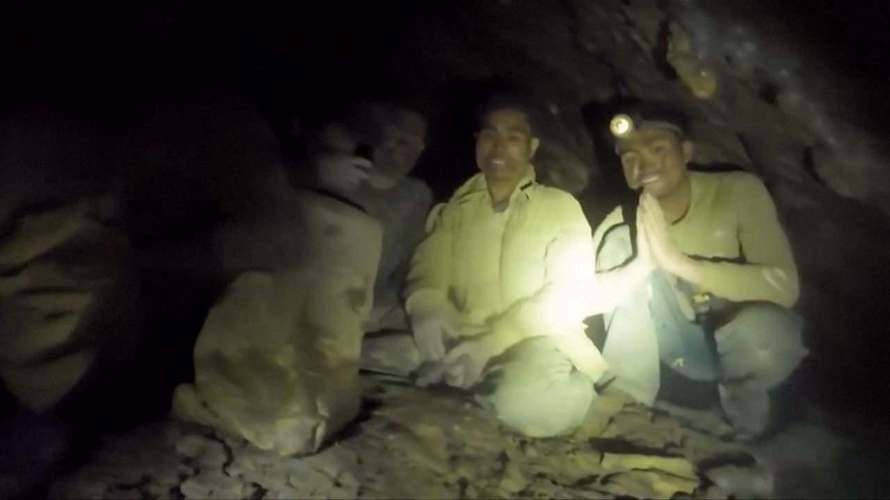 First of five men found alive in flooded Laos cave rescued.