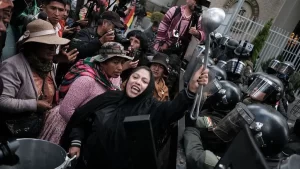 Bolivia's defense minister resigns as anti-government protests intensify.