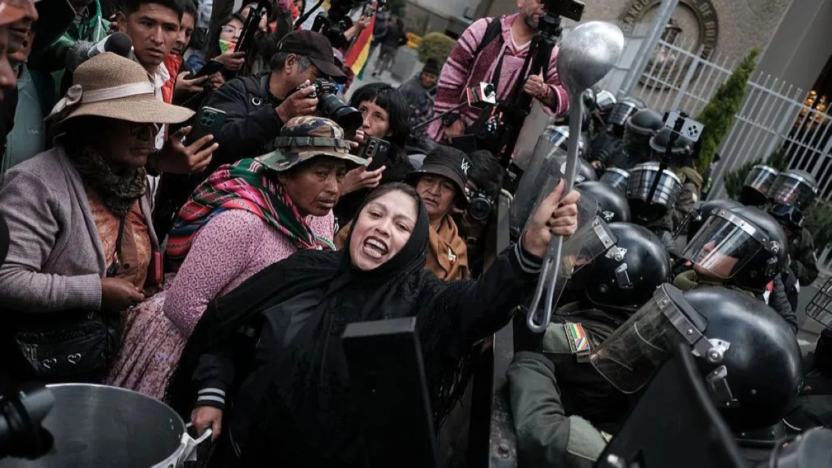 Bolivia's defense minister resigns as anti-government protests intensify.