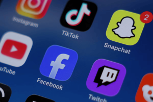 Instagram, TikTok, Snapchat, YouTube, Facebook, Twitch and Reddit applications are displayed on a mobile phone in this picture illustration taken on June 11th, 2026.