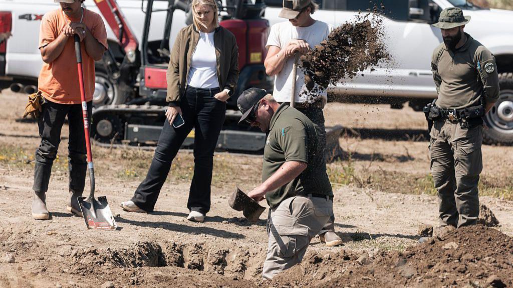 Investigators search for animal remains as part of an active investigation into alleged animal cruelty, fraud and theft in Fortuna, California.