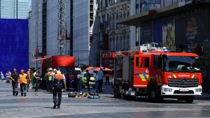Six people found dead in lift shaft after fire in central Brussels building.