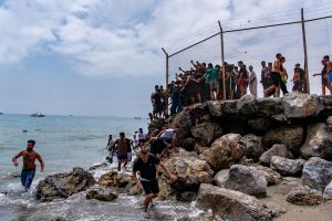 Spain sending troops as thousands enter enclave of Ceuta from Morocco.