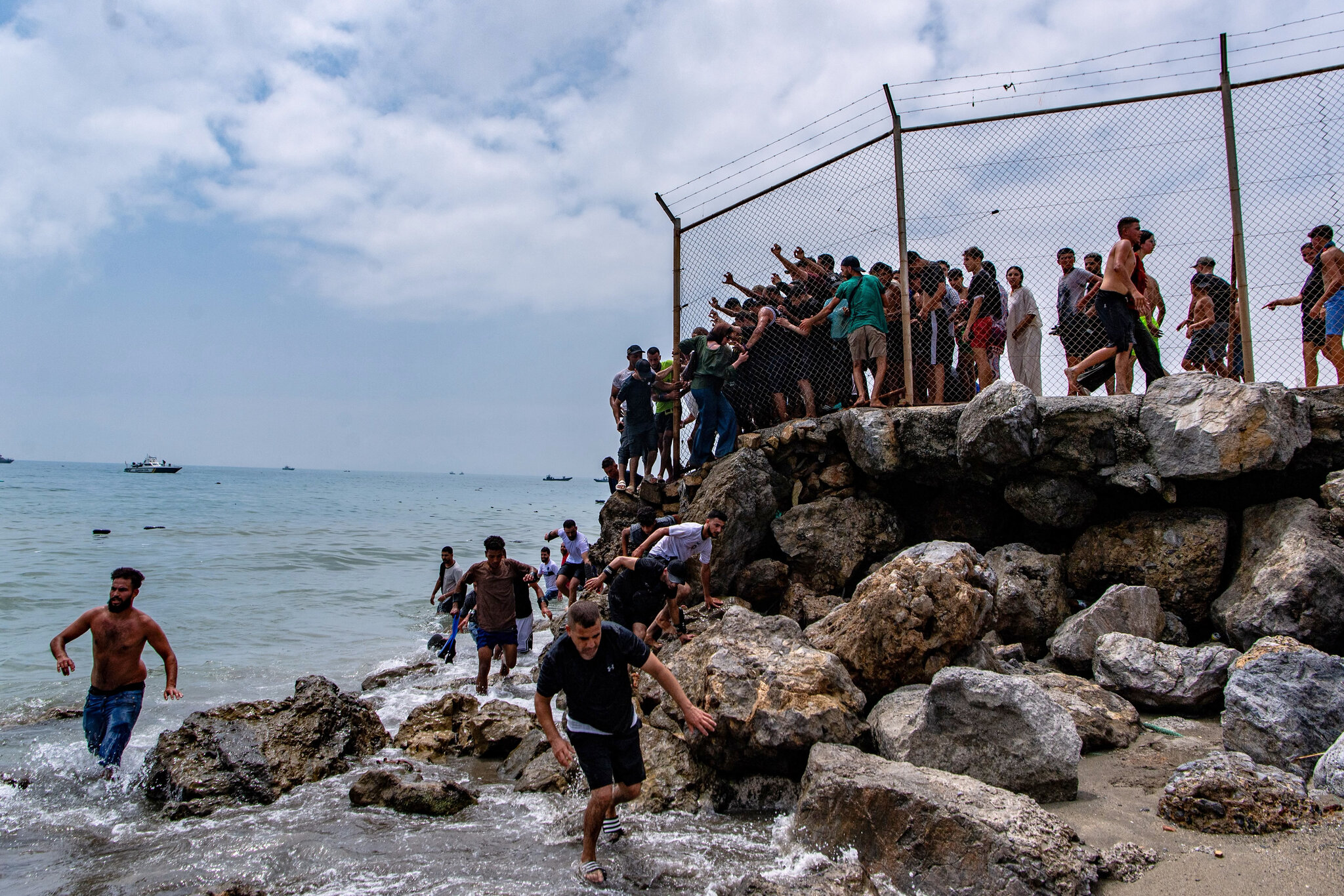 Spain sending troops as thousands enter enclave of Ceuta from Morocco.