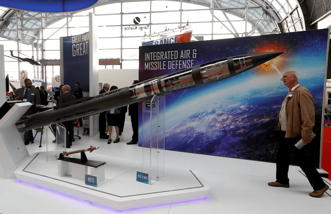 A man looks at a Patriot Advanced Capability (PAC-3) Missile Segment Enhancement (MSE) model by Lockheed Martin at an international military fair in Kielce, Poland September 7, 2017.