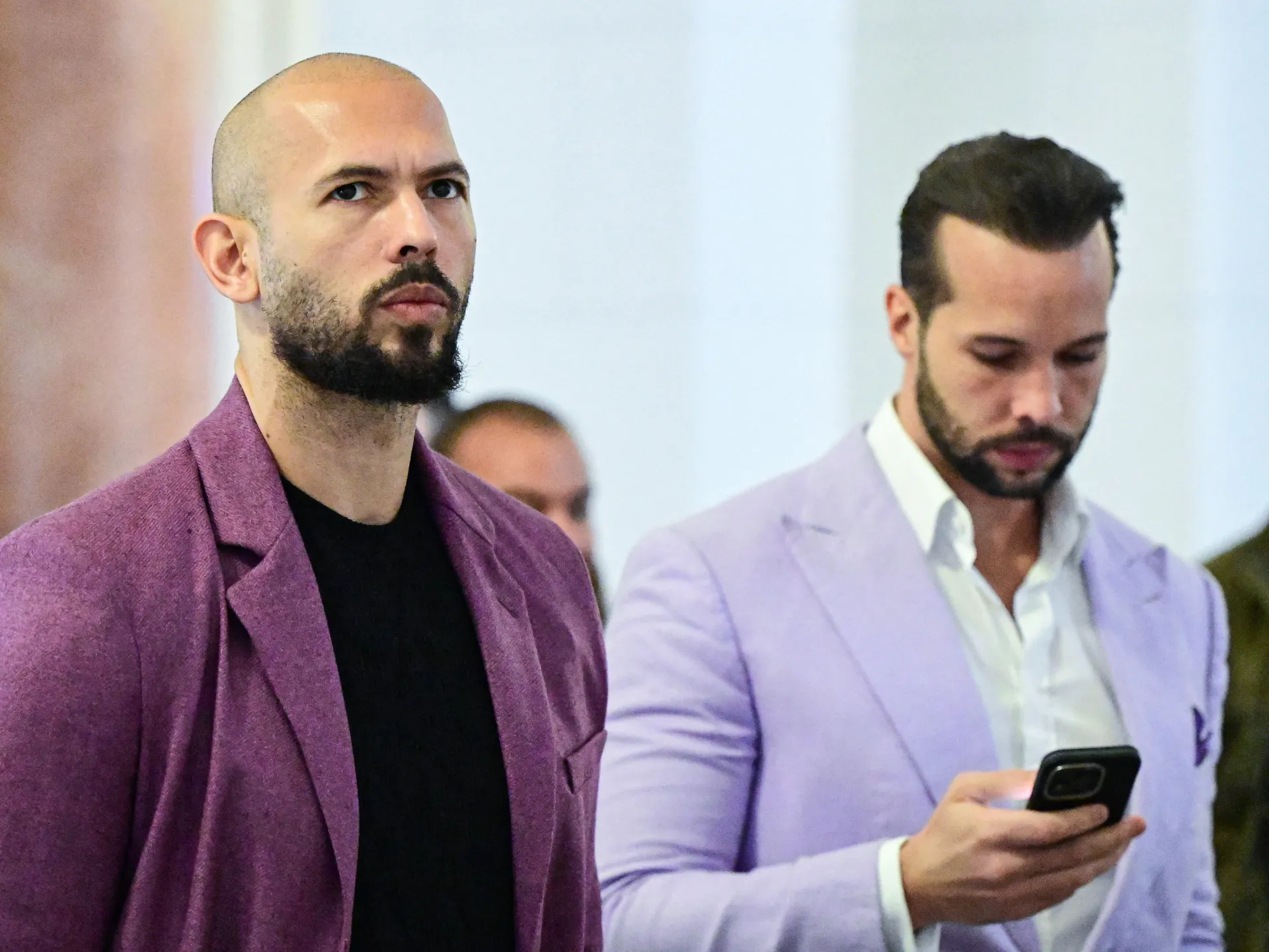 Tate brothers arrested in US as further UK charges take total to 59.