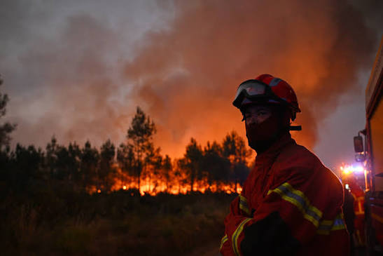 Three Greek firefighters die as wildfires threaten parts of southern Europe.