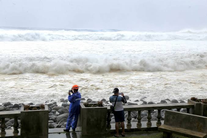 East Asia braces for destructive typhoon as landslides kill 15 in Philippines.