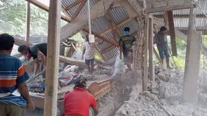 Powerful 7.7-magnitude earthquake kills at least 38 in Indonesia.