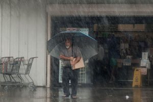 Hurricane Lala sparks flash floods in Hawaii as strong winds and rain persist.