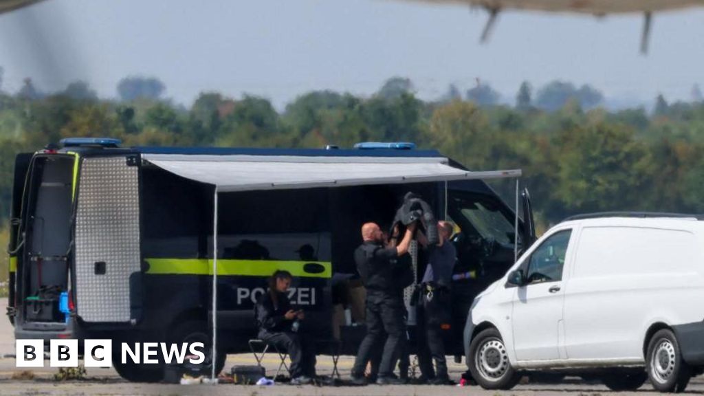 Drone carrying explosives found at German airport, police say.
