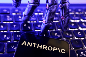 Anthropic logo, a keyboard and a robotic hand in this illustration taken June 5, 2026.