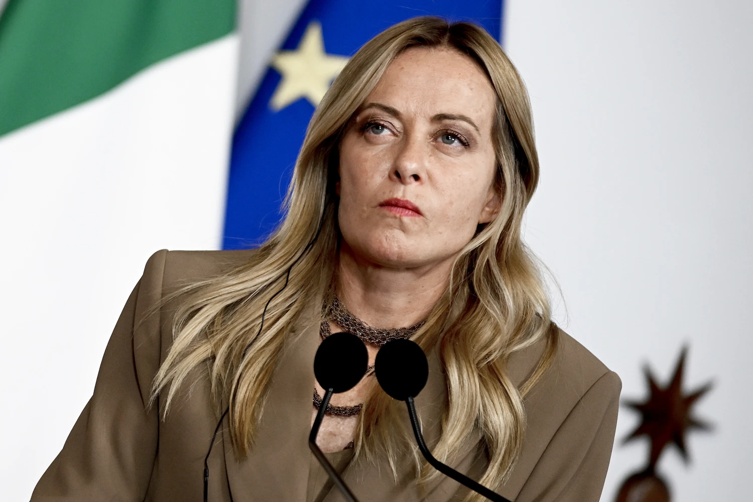 Italy to ban veils in schools, limit foreign students per class, Meloni says.